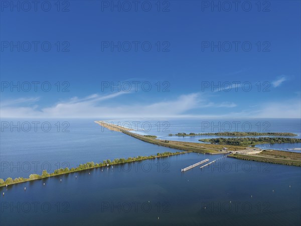 Aerial view with the Markerwaarddijk between Markermeer and IJsselmeer