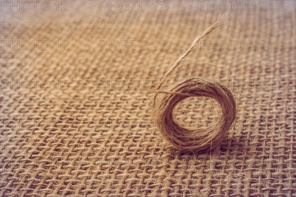 Roll of brown color linen string paper background