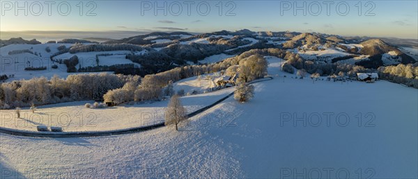 Panorama over snow-covered Jura mountains