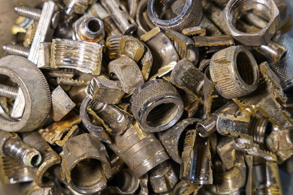 Old brass nuts and fittings for plumbing use recycling. Recycling of non-ferrous scrap