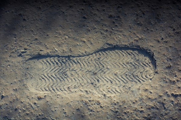 Footstep pattern seen on a concrete background