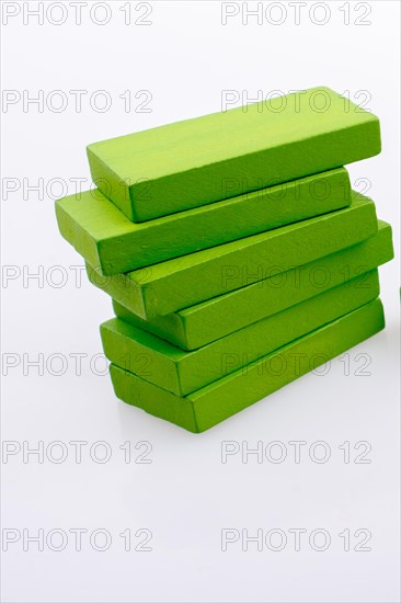 Colorful Domino Blocks in a line on a white background