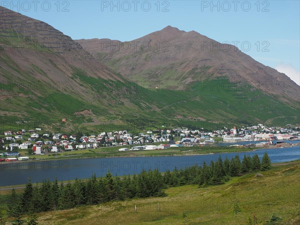 Blue sky over fjord