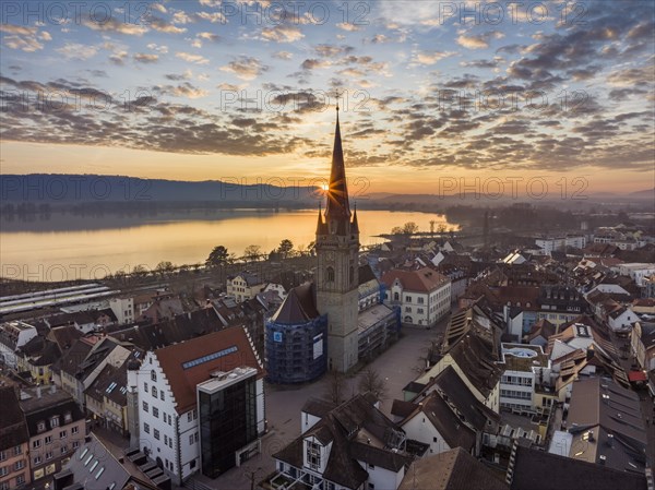 Aerial view of the old town of Radolfzell on Lake Constance at sunset with the cathedral