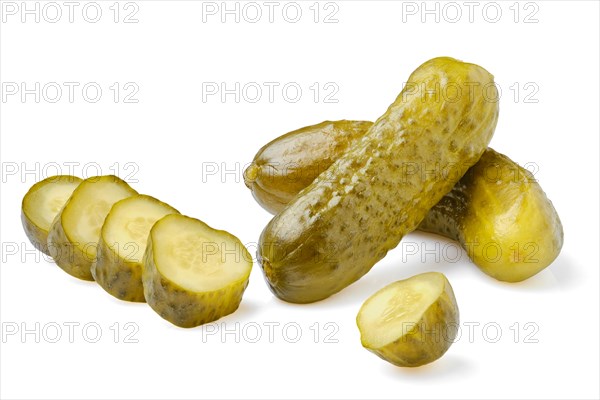 Pickled cucumbers whole and sliced isolated on white background