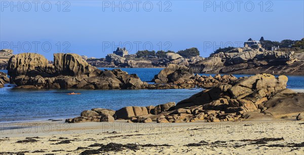 View from the beach Plage Greve Rose on the granite coast and offshore islands