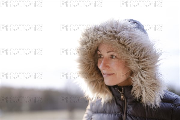 Woman with fur hood