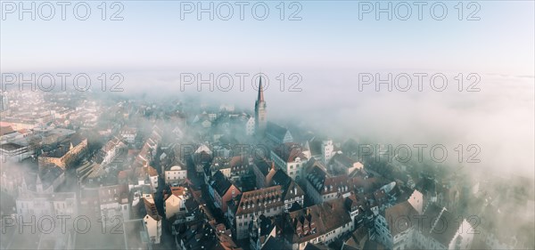 Swathes of fog drift over the old town of Radolfzell on Lake Constance