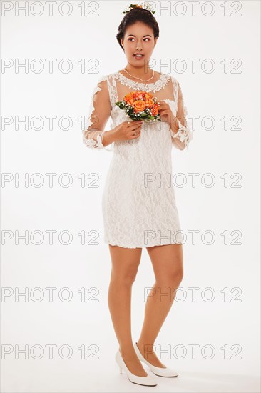 Bride with bouquet of roses