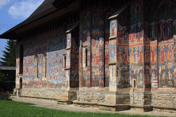 Restorer at work on the frescoes