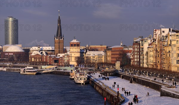 Rhine bank and old town in the snow