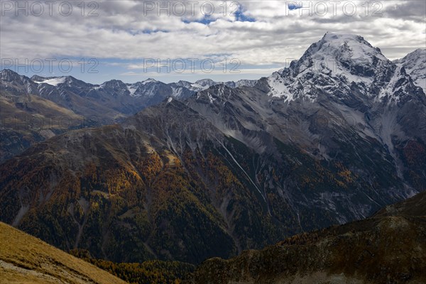 Autumnal mountain landscape with Ortles mountains