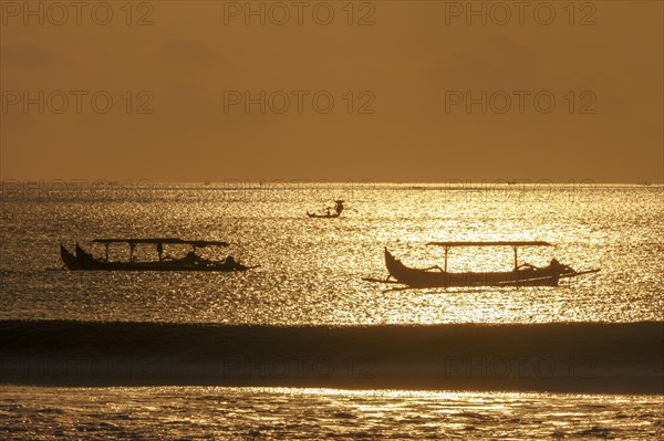 Fishing outriggers on the beach of Kuta