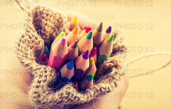 Color Pencils in a linen sack on canvas