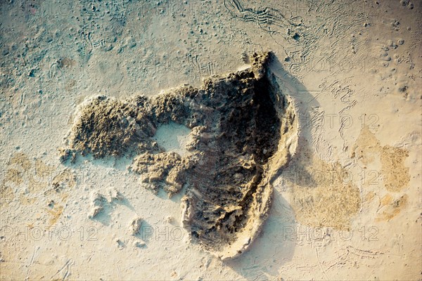 Footstep pattern seen on a concrete background