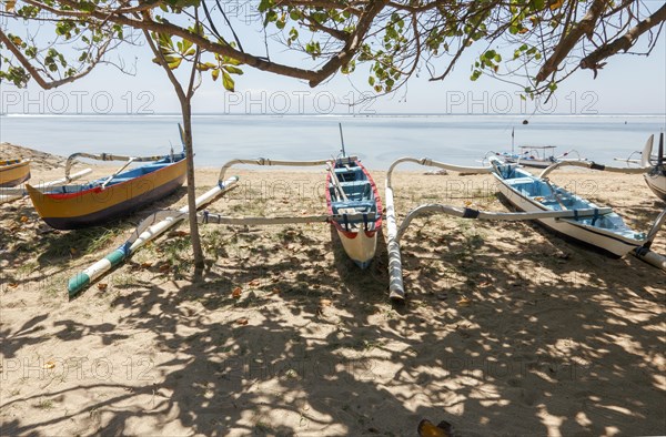 Fishing outriggers on the beach at Sanur