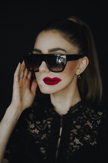 Woman with staggered red lips