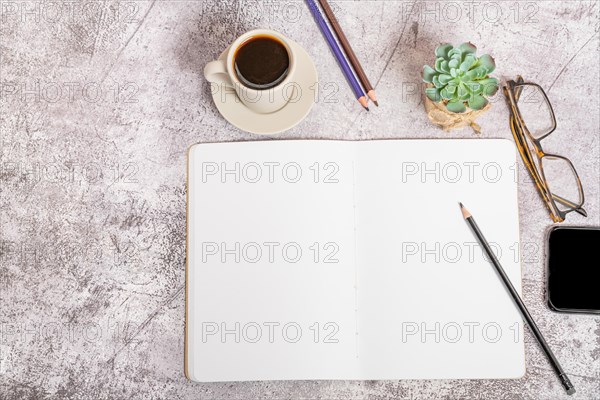 Top view of a notebook with blank pages