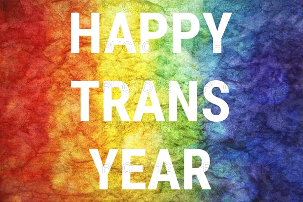 Happy trans year words on LGBT textured background