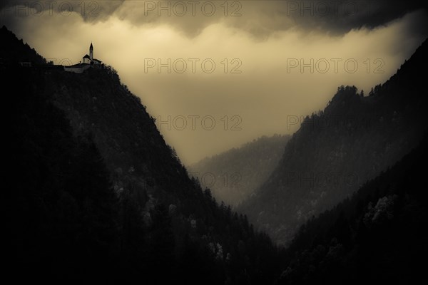 Church of St. Catherine against a threatening cloudy sky