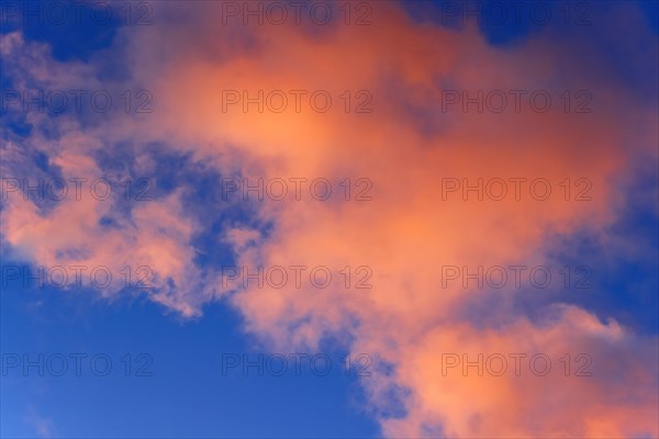 Dramatic evening sky with red clouds at sunset