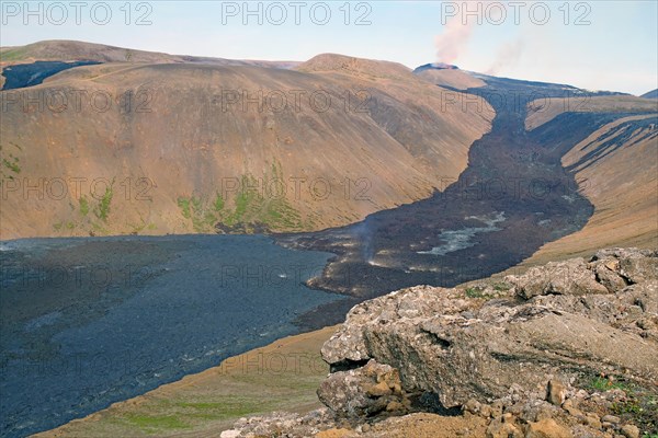 Lava floods a long valley