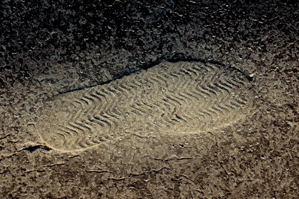 Footstep pattern seen on a concrete background