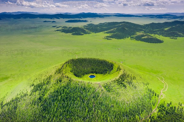 Old crater of the volcanic mountain Uran Togoo. Bulgan Province