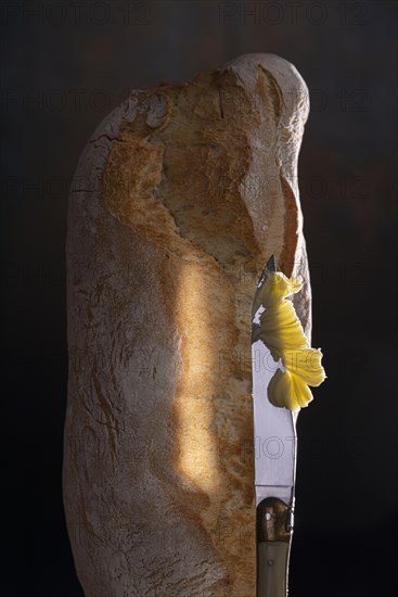 Ciabatta bread with knife and butter