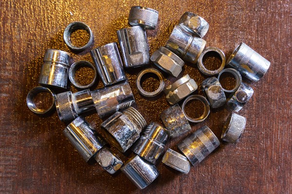 Old brass nuts and fittings for plumbing use recycling. Recycling of non-ferrous scrap