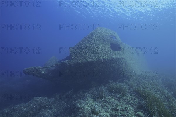 Wreck of the Cimentiere in the Mediterranean Sea near Hyeres. Dive site Giens Peninsula