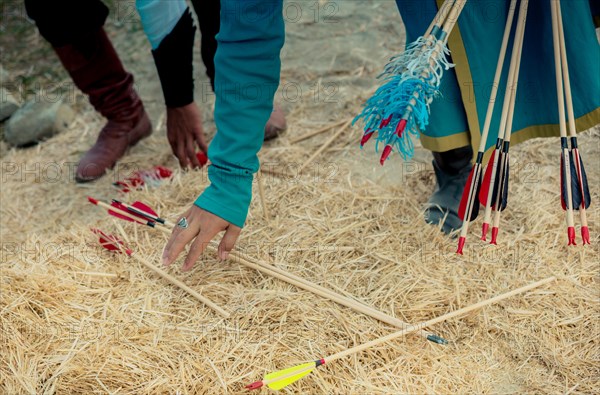 Arrow in hand as rprojectile weapon system archery