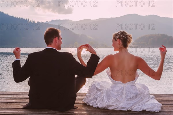 Bride and groom meditating