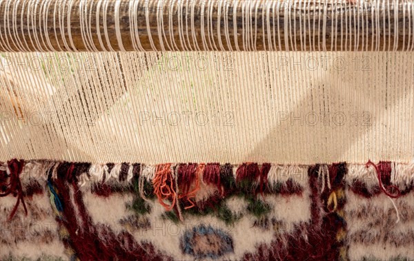 Carpet of traditional types made on a loom