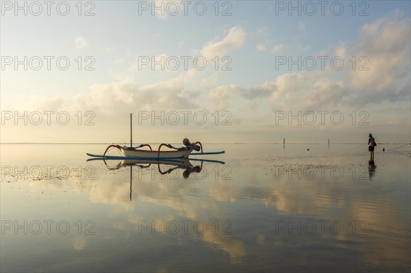 Fishing outriggers on the beach of Sanur