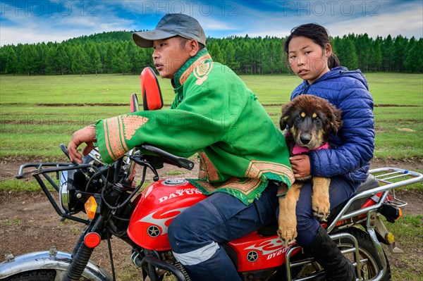 Children finally find their baby dog. Bulgan Province