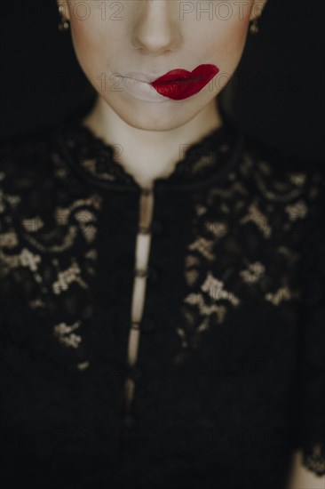 Woman with staggered red lips