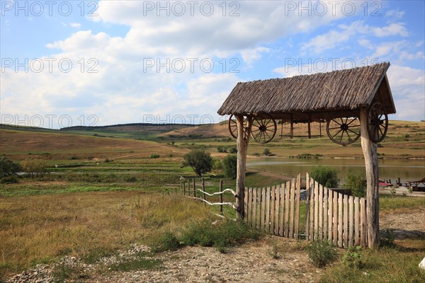 Transylvanian wooden gate at the entrance to an agricultural property