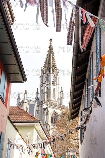 Minster of Our Lady framed by Haeussergasse at carnival time