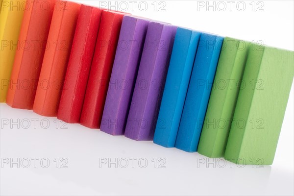 Colorful Domino Blocks in a line on a white background