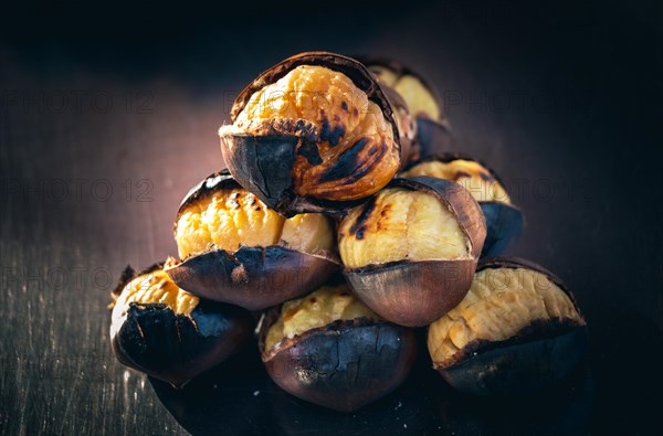 Organic brown chestnuts roasted over a hot fire