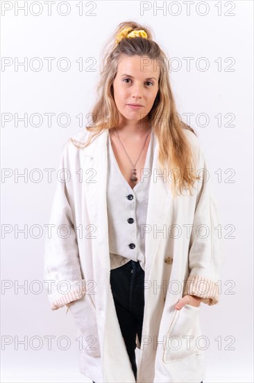 Blond young woman in a portrait isolated on a white background