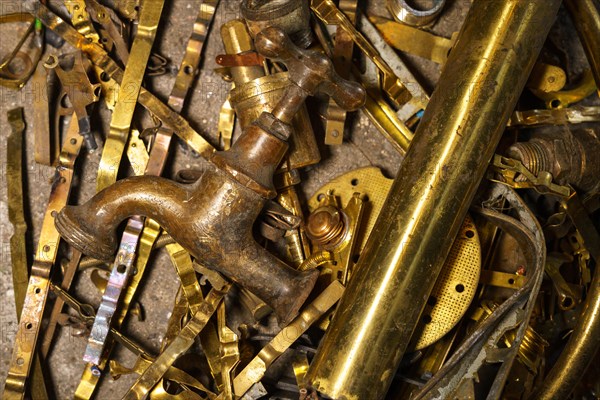 Old brass elements plumbing in recycling. Recycling of non-ferrous scrap