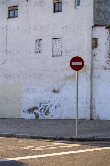 Traffic sign of no passage in a street in a suburb of the city of Barcelona