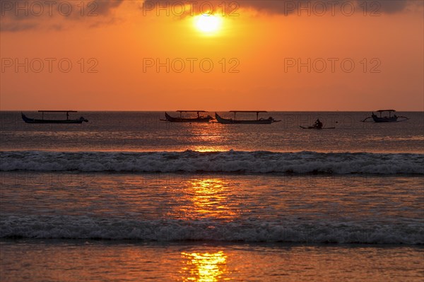 Fishing outriggers on the beach of Kuta