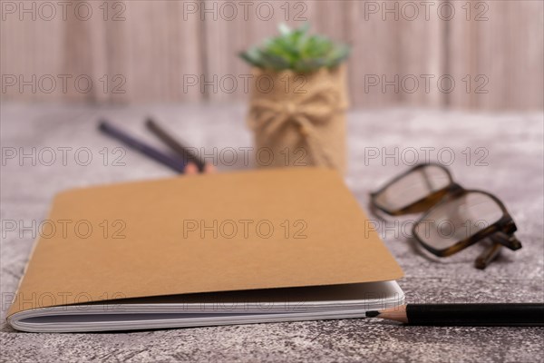 Closed notebook with brown covers