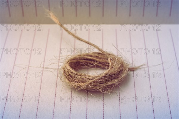 Roll of brown color linen string paper background