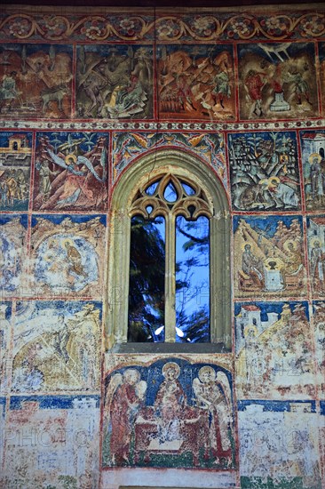 Frescoes on the outer wall. The Voronet Monastery