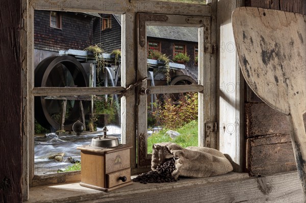 Farmhouse parlour with coffee mill and coffee beans on the windowsill