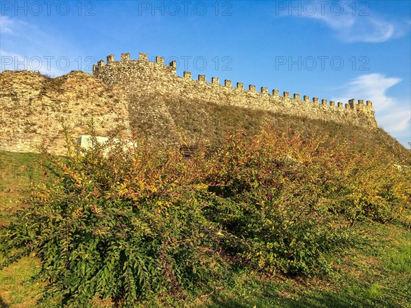 Medieval wall with battlements of fortification historical castle Castello Rocca di Lonato from the Middle Ages